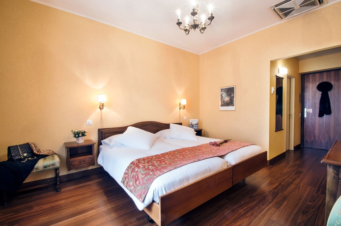 Imagen de la habitación del Hotel International Au Lac Historic Lakeside. Foto 6