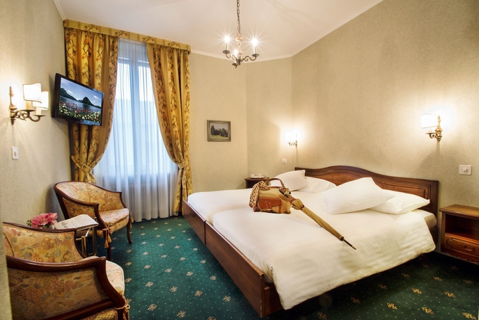 Imagen de la habitación del Hotel International Au Lac Historic Lakeside. Foto 7