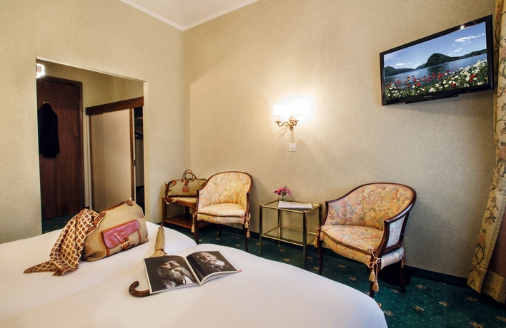 Imagen de la habitación del Hotel International Au Lac Historic Lakeside. Foto 8