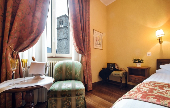 Imagen de la habitación del Hotel International Au Lac Historic Lakeside. Foto 11