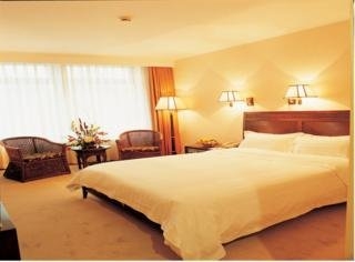Imagen de la habitación del Hotel International Bamboo and Rattan Tower. Foto 3