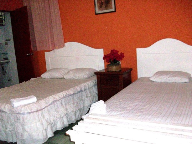 Imagen de la habitación del Hotel International Guest House. Foto 2