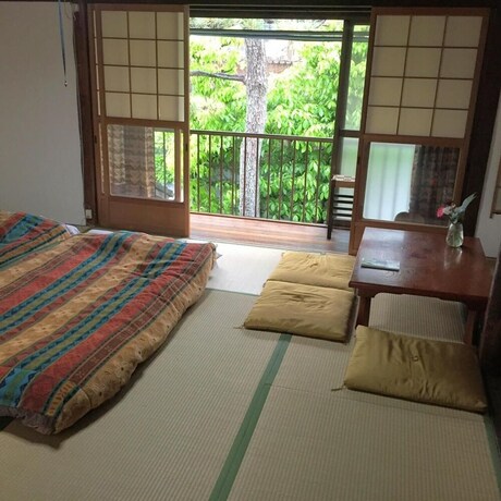 Imagen de la habitación del Hotel International Guest House Tani House. Foto 33