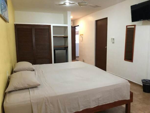 Imagen de la habitación del Hotel International House, Playa del Carmen. Foto 5
