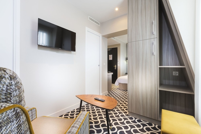 Imagen de la habitación del Hotel International, París. Foto 4