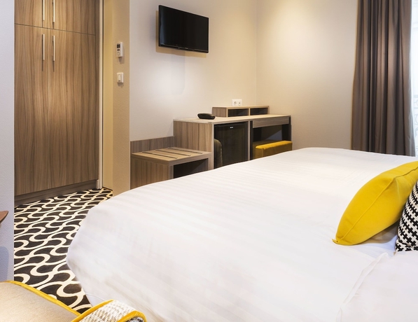 Imagen de la habitación del Hotel International, París. Foto 5