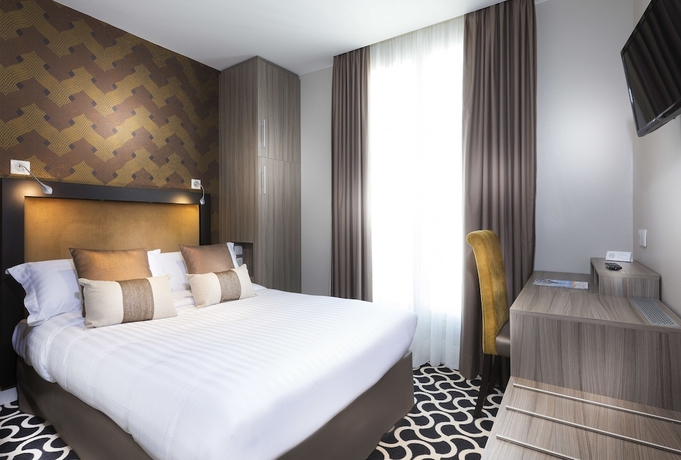 Imagen de la habitación del Hotel International, París. Foto 7