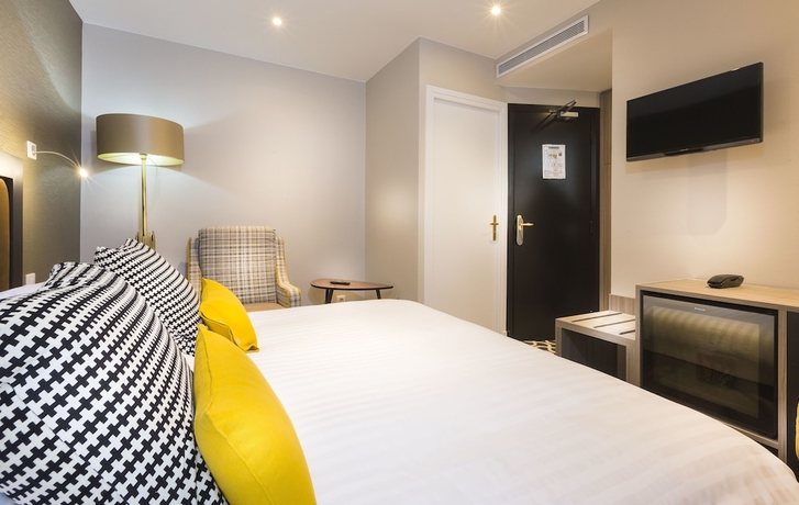 Imagen de la habitación del Hotel International, París. Foto 11