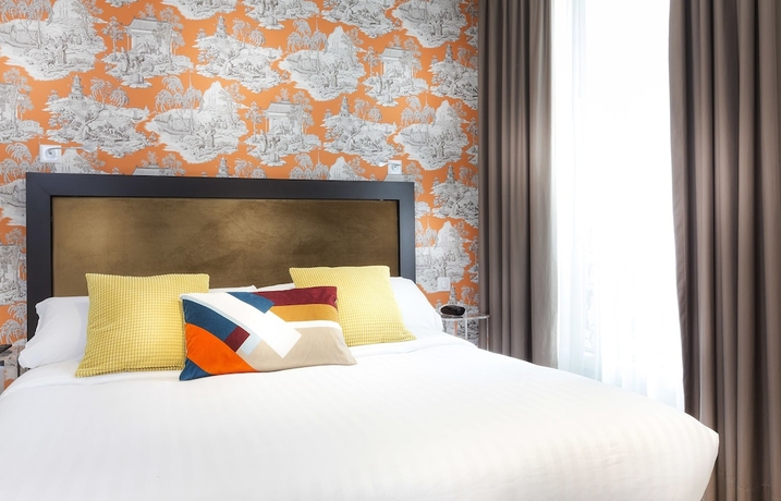 Imagen de la habitación del Hotel International, París. Foto 13