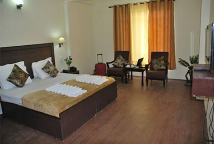 Imagen de la habitación del Hotel International Residency. Foto 17