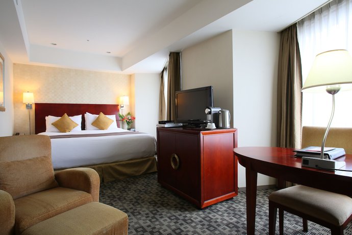 Imagen de la habitación del Hotel International Resort Yurakujo. Foto 14