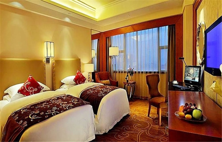 Imagen de la habitación del Hotel International Ruian. Foto 14