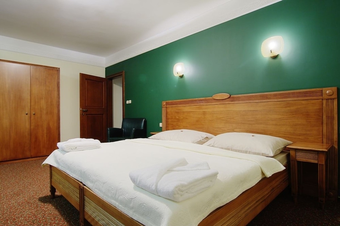 Imagen de la habitación del Hotel International, Veľká Lomnica. Foto 6