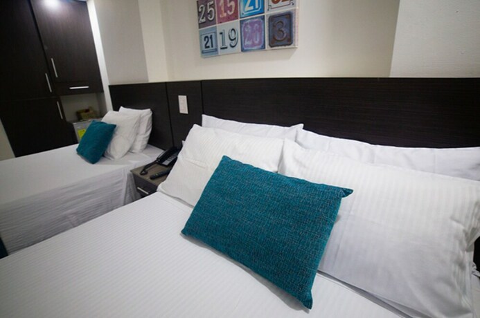 Imagen de la habitación del Hotel Interpacific. Foto 16