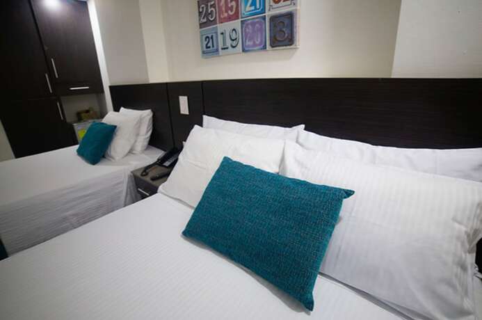 Imagen de la habitación del Hotel Interpacific. Foto 19