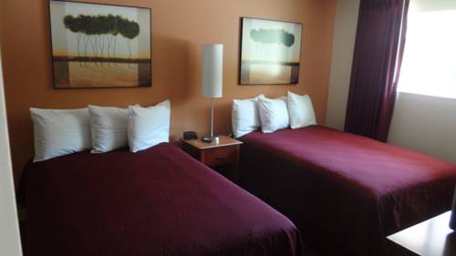 Imagen de la habitación del Hotel Interurban Suites. Foto 1
