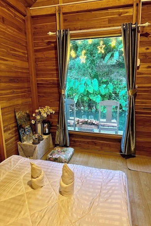 Imagen de la habitación del Hotel Inthawa Resort (Feuang, Laos). Foto 11