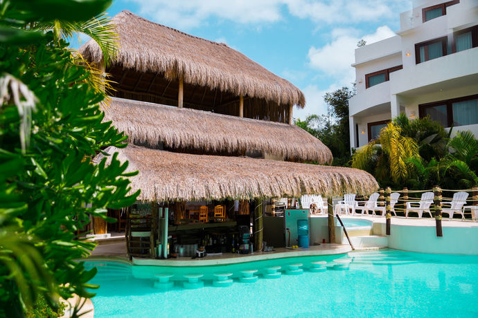 Imagen de la piscina del Hotel Intima Resort Tulum - Clothing Optional - Adults O. Foto 11