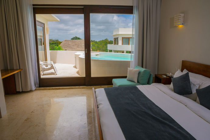 Imagen de la piscina del Hotel Intima Resort Tulum - Clothing Optional - Adults O. Foto 13