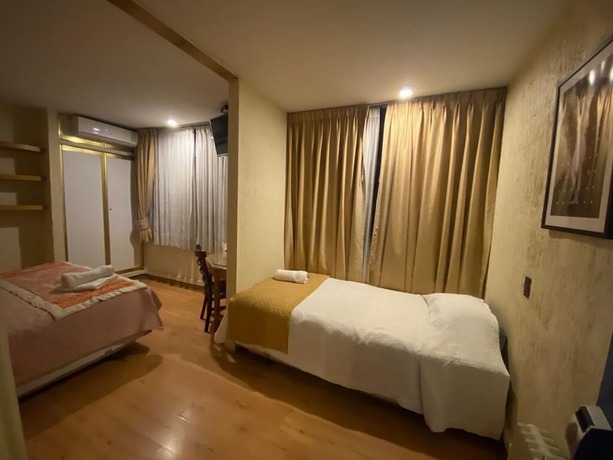 Imagen de la habitación del Hotel Intimo Miraflores. Foto 19