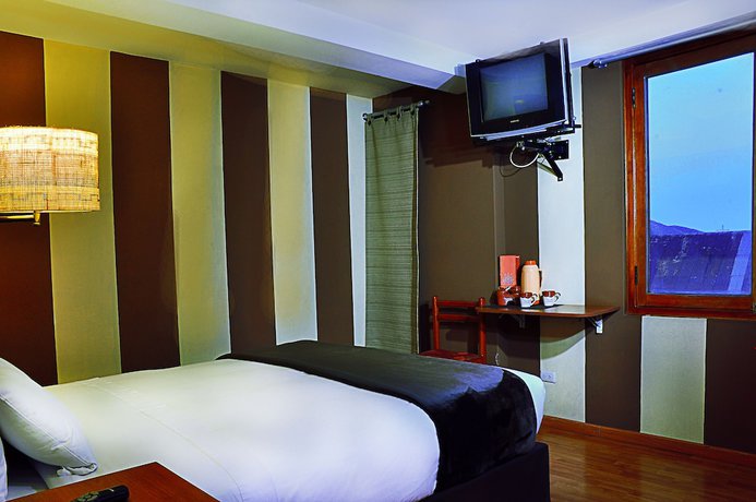 Imagen de la habitación del Hotel Intiqa. Foto 8