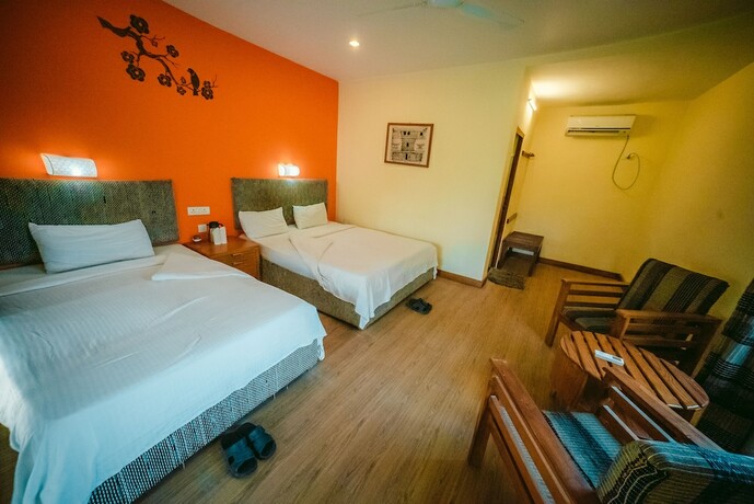 Imagen de la habitación del Hotel Into The Wild Eco Resort. Foto 19