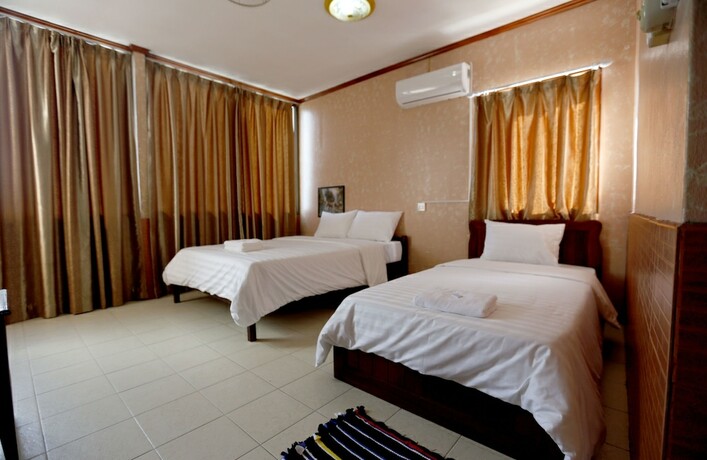 Imagen de la habitación del Hotel Intouch Guest House. Foto 5
