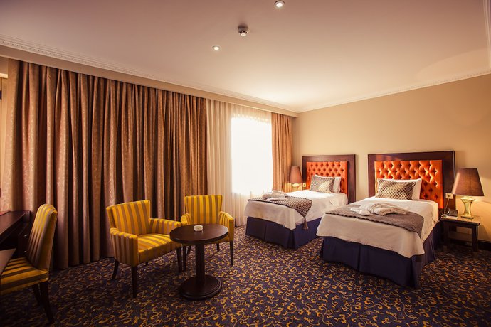 Imagen de la habitación del Hotel Intourist Palace Batumi. Foto 8