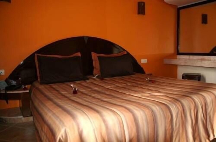 Imagen de la habitación del Hotel Intouriste and Suites. Foto 11