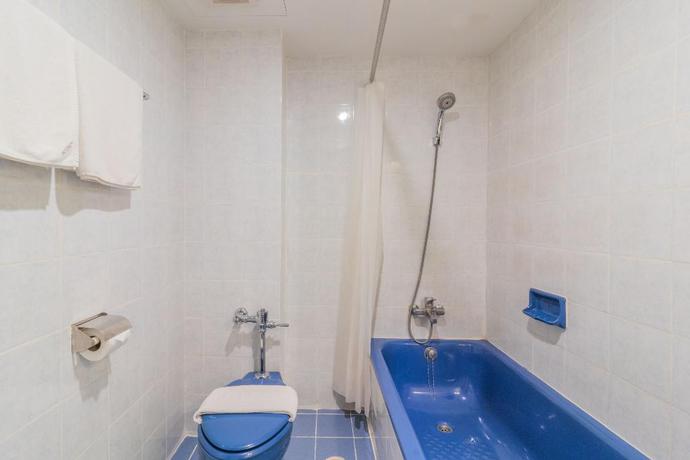 Imagen de la habitación del Hotel Intown Residence. Foto 7