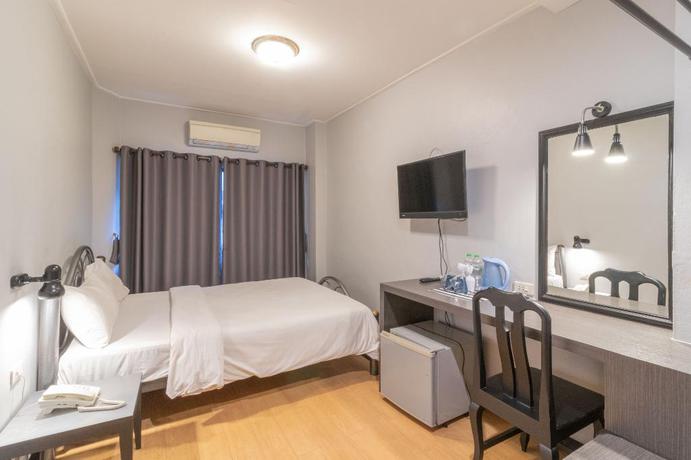 Imagen de la habitación del Hotel Intown Residence. Foto 9