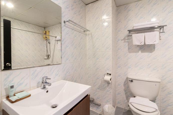 Imagen de la habitación del Hotel Intown Residence. Foto 11