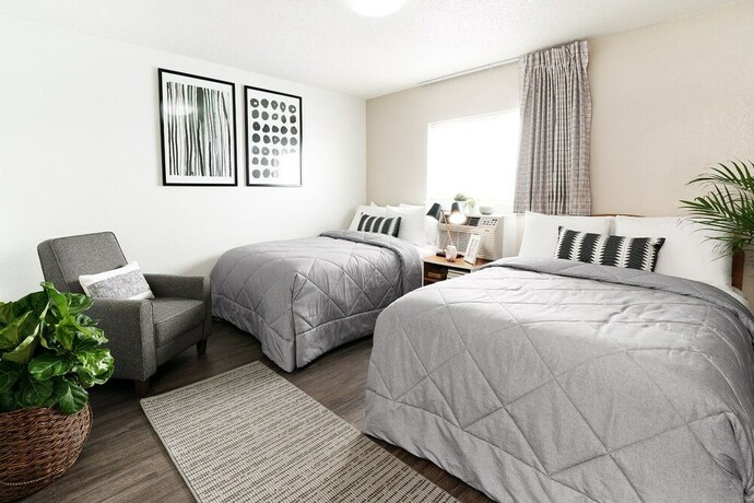 Imagen de la habitación del Hotel Intown Suites Extended Stay Lewisville Tx East Corporate Drive. Foto 16