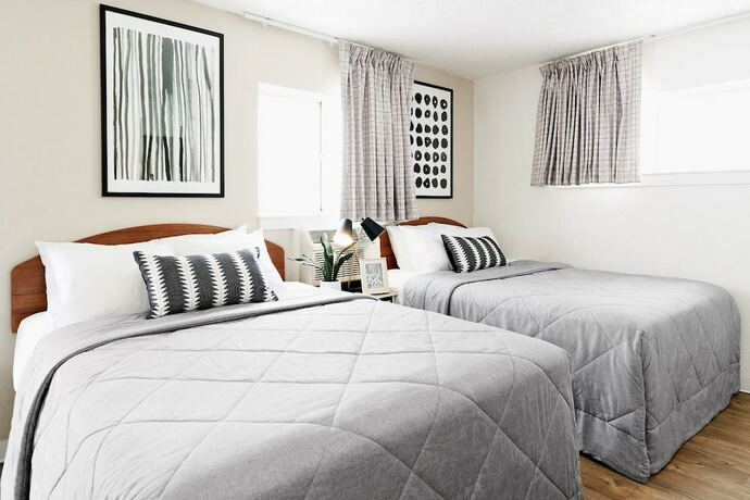 Imagen de la habitación del Hotel Intown Suites Extended Stay Raleigh Nc - Capital Blvd. Foto 10