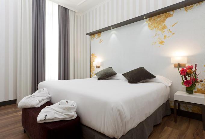 Imagen de la habitación del Hotel Intur Palacio San Martin. Foto 6