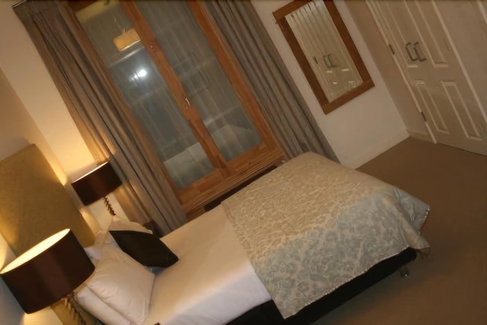 Imagen de la habitación del Hotel Inverness Place. Foto 7