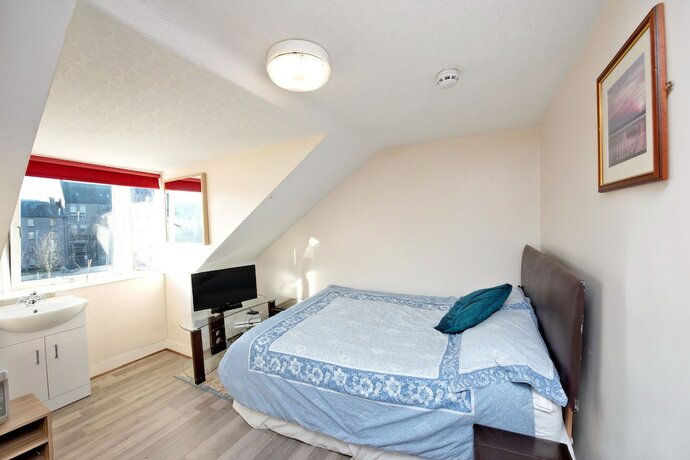 Imagen de la habitación del Hotel Inviting 9-bed House in Aberdeen. Foto 20