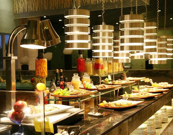Imagen del bar/restaurante del Hotel Inzone Garland. Foto 7