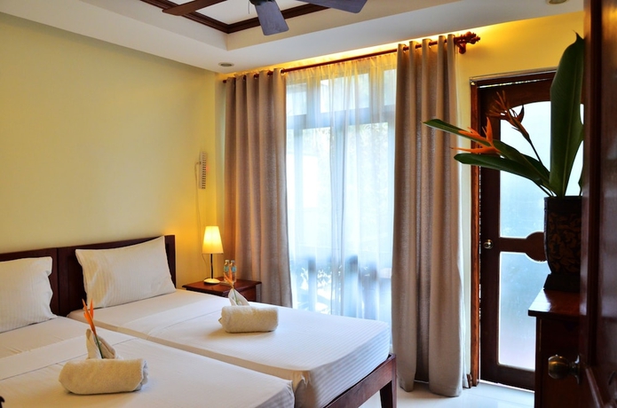 Imagen de la habitación del Hotel Ipil Suites El Nido. Foto 11