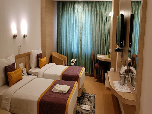 Imagen de la habitación del Hotel Ira By Orchid Bhubaneswar. Foto 7