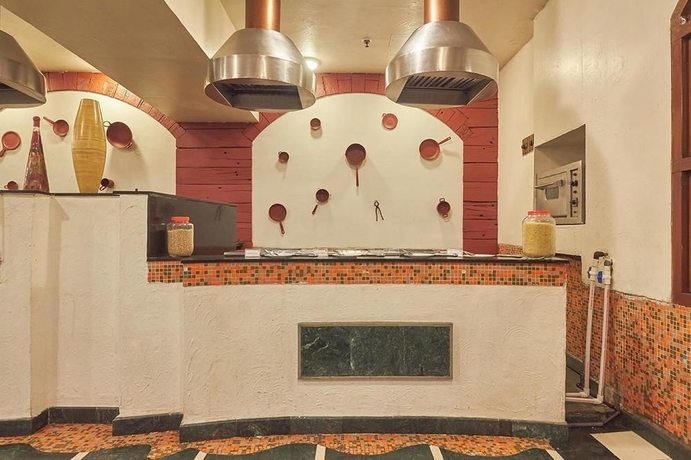 Imagen del bar/restaurante del Hotel Ira By Orchid Mumbai T-2 International Airport. Foto 2