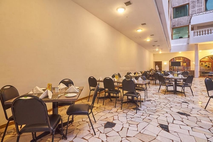 Imagen del bar/restaurante del Hotel Ira By Orchid Mumbai T-2 International Airport. Foto 3