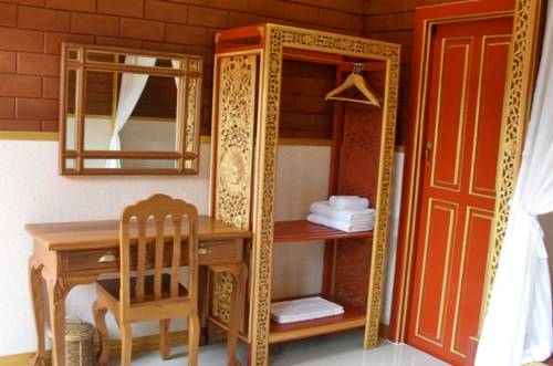 Imagen de la habitación del Hotel Irawadee Resort. Foto 11