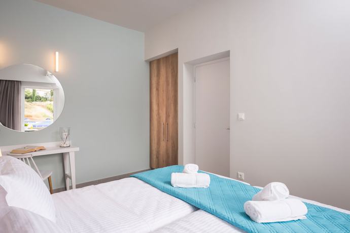 Imagen de la habitación del Hotel Irini Stalos Apartments. Foto 16