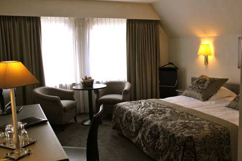Imagen de la habitación del Hotel Iris, De Panne. Foto 5