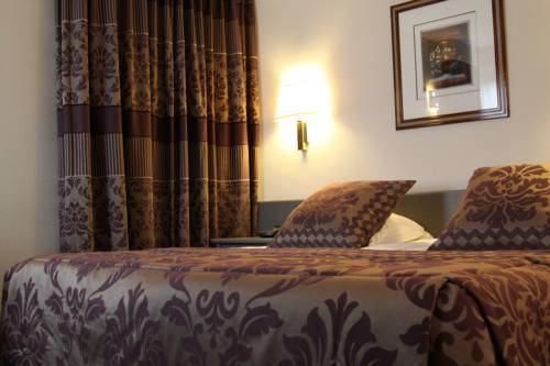 Imagen de la habitación del Hotel Iris, De Panne. Foto 6