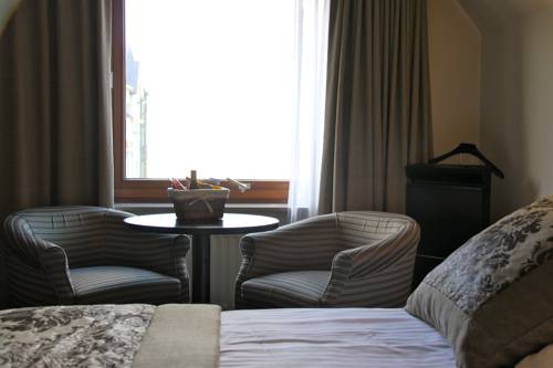 Imagen de la habitación del Hotel Iris, De Panne. Foto 7