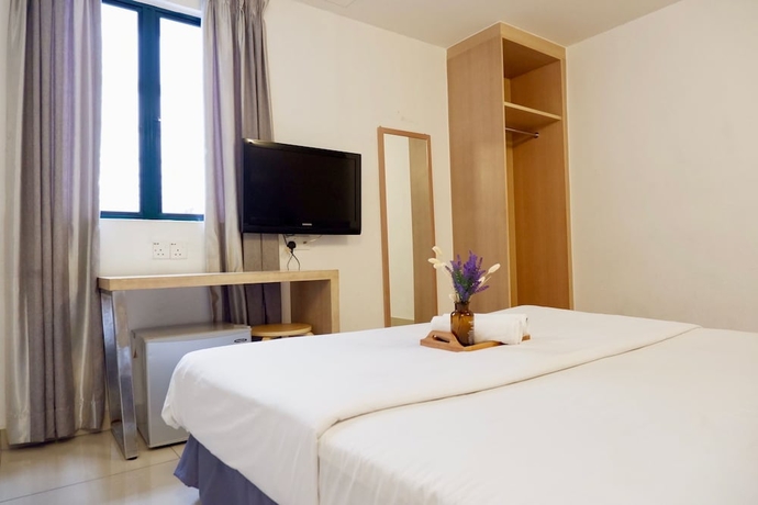 Imagen de la habitación del Hotel Iris Garden. Foto 11