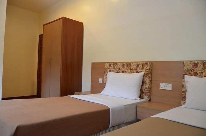 Imagen de la habitación del Hotel Iris House Resort. Foto 38