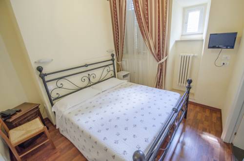 Imagen de la habitación del Hotel Iris, Perugia. Foto 11